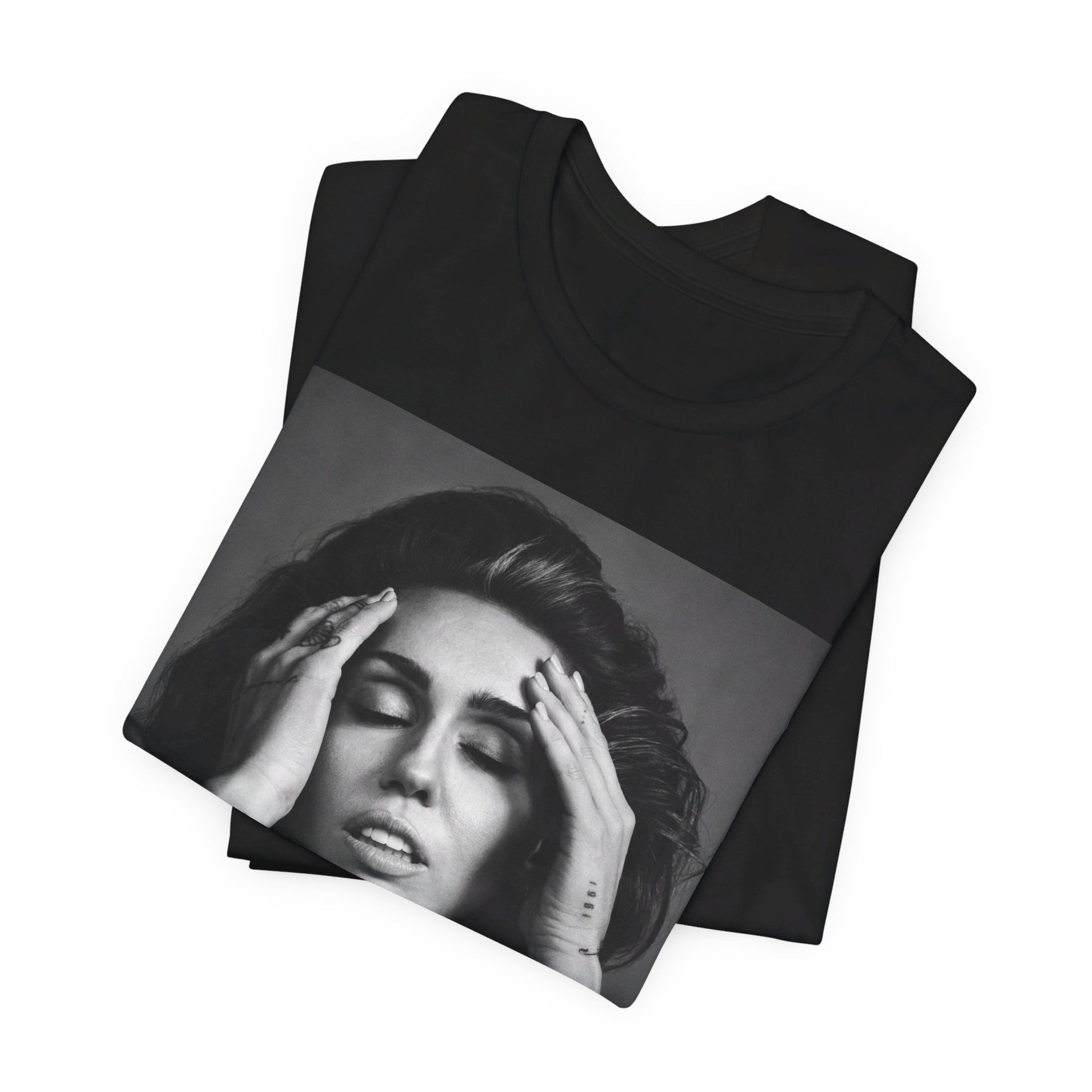 A black graphic t-shirt featuring a retro graphic related to Miley Cyrus' 'Bangerz' album era.
