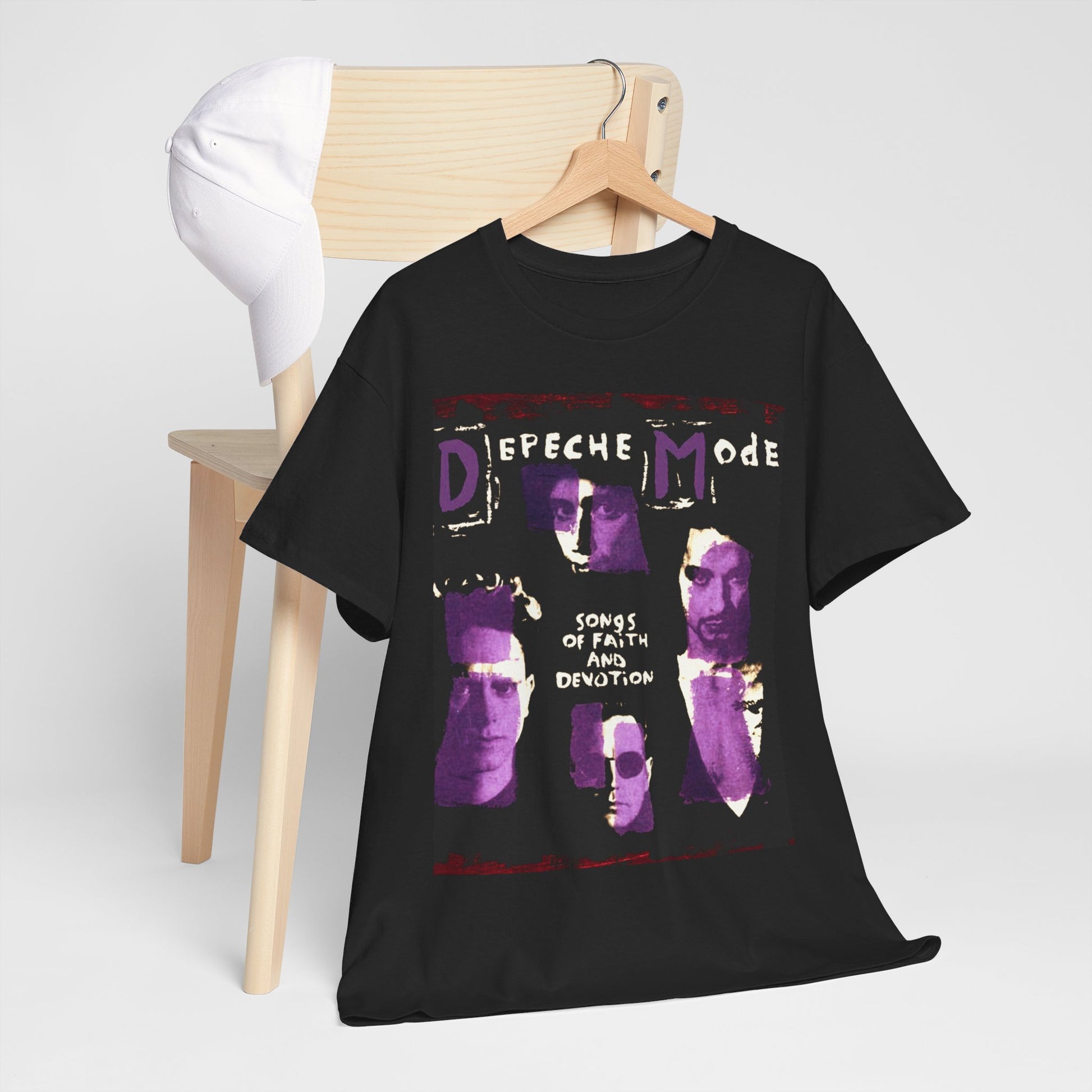 A black graphic t-shirt featuring a graphic related to Depeche Mode's 'Songs of Faith and Devotion' album.