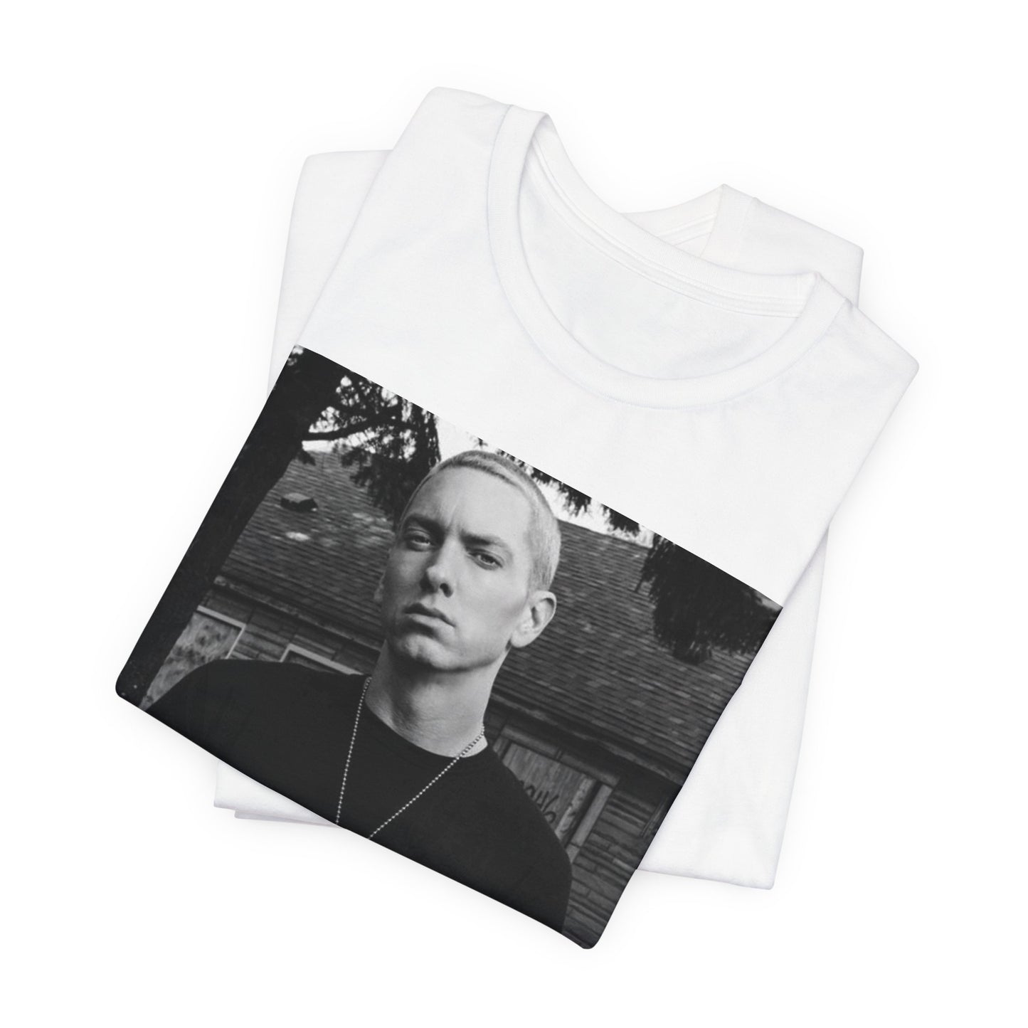 A black graphic t-shirt featuring a black and white graphic of Eminem as Slim Shady.