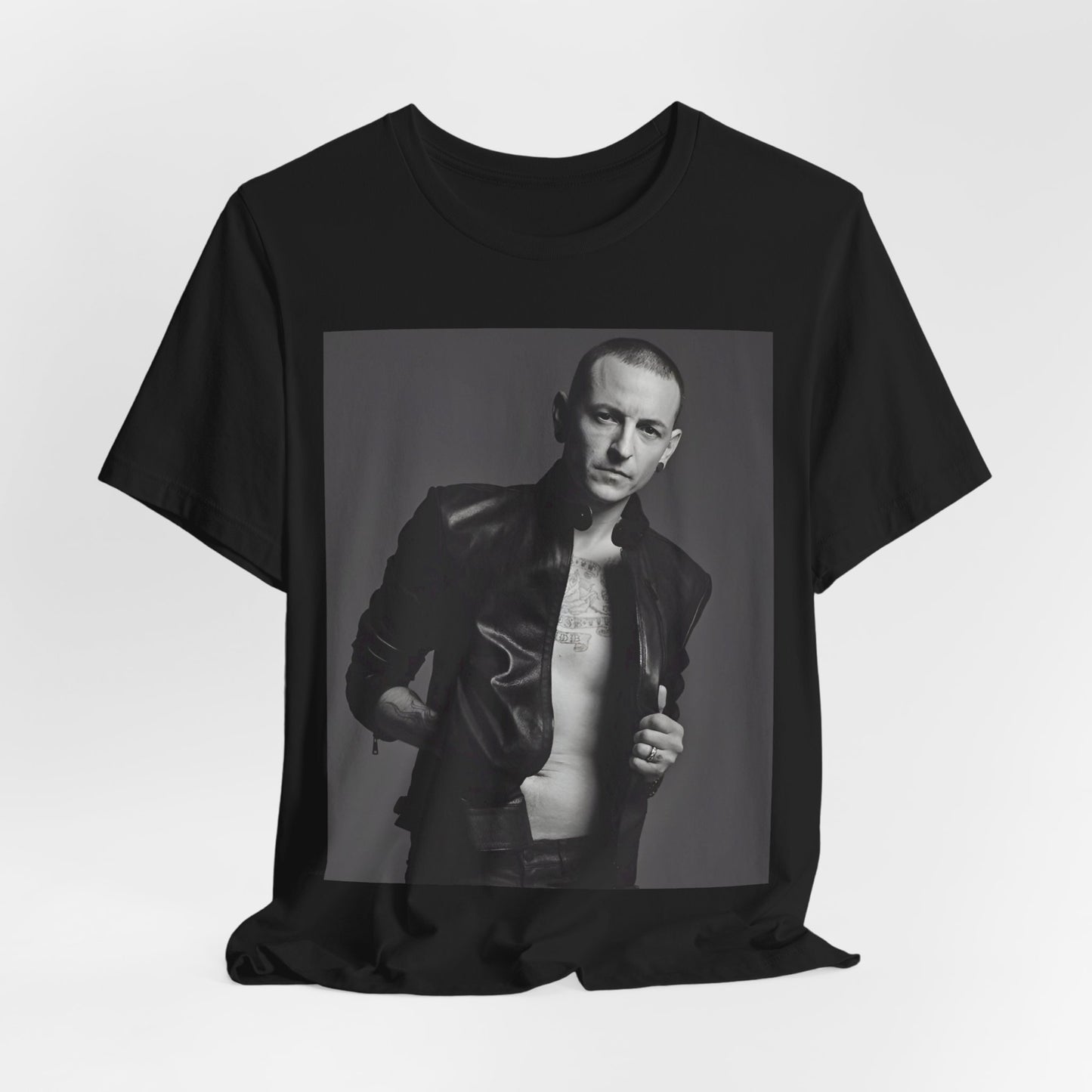 A black graphic t-shirt featuring a graphic of Chester Bennington from Linkin Park as a rock icon.