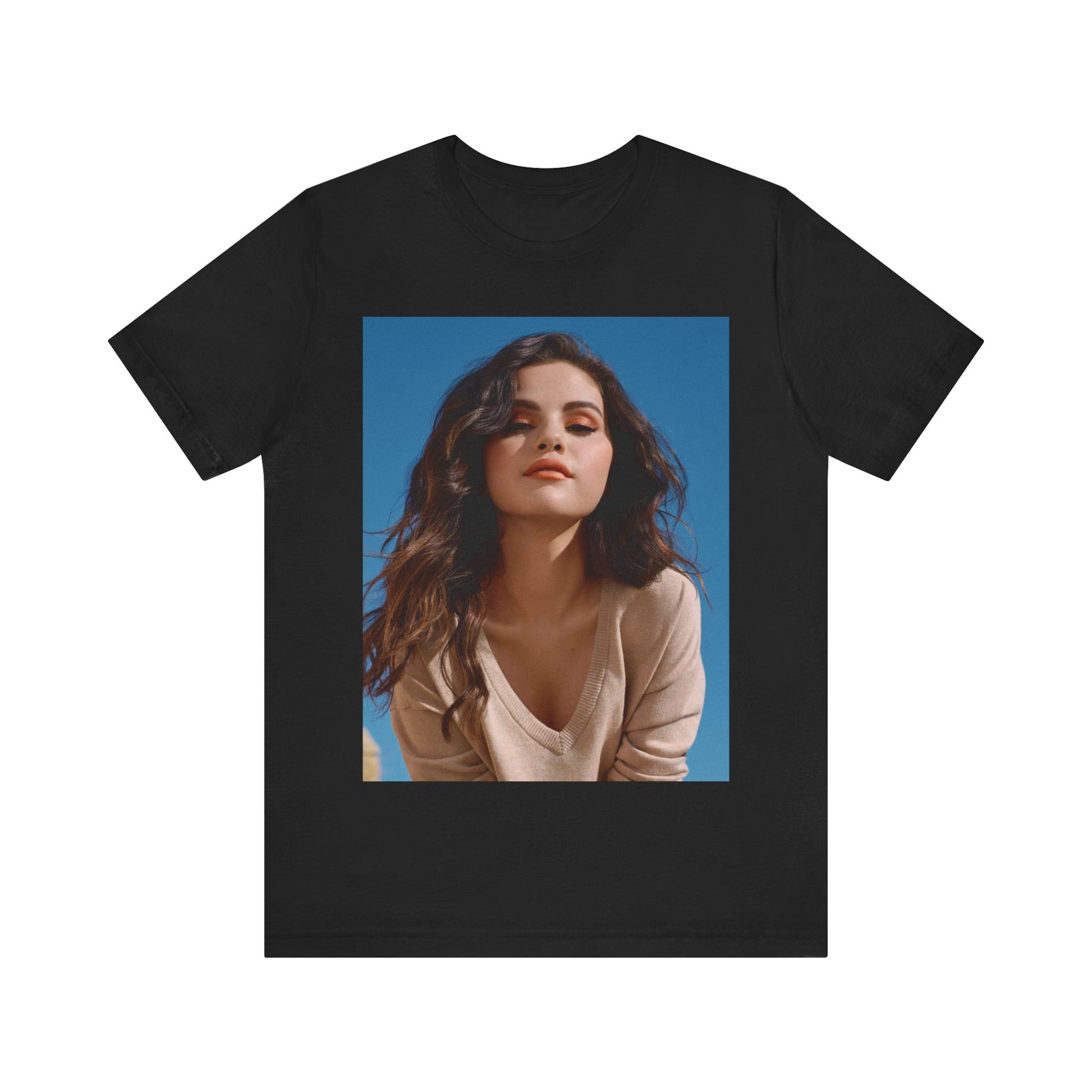 A black graphic t-shirt featuring a vintage pop icon graphic of Selena Gomez.
