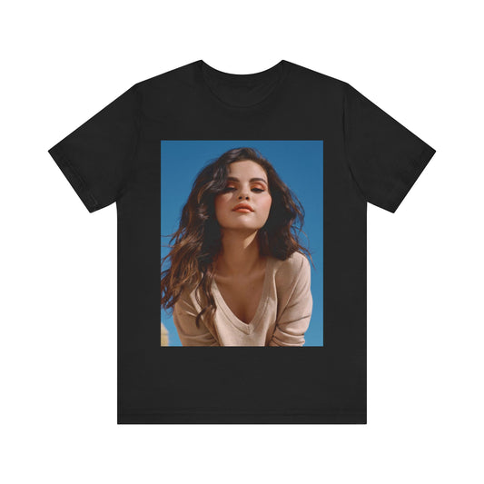 A black graphic t-shirt featuring a vintage pop icon graphic of Selena Gomez.
