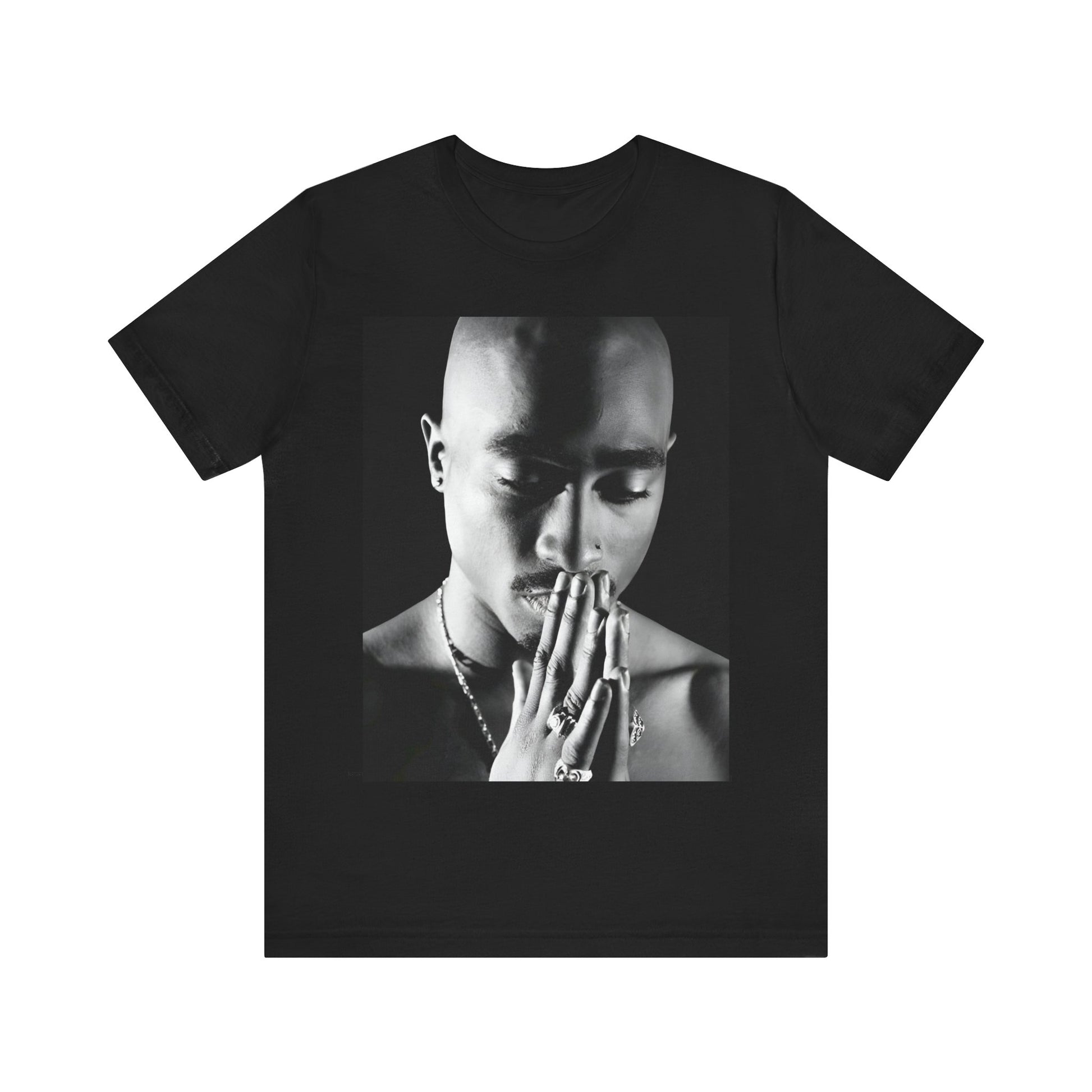 A black graphic t-shirt featuring a black and white streetwear rebel graphic of Tupac.