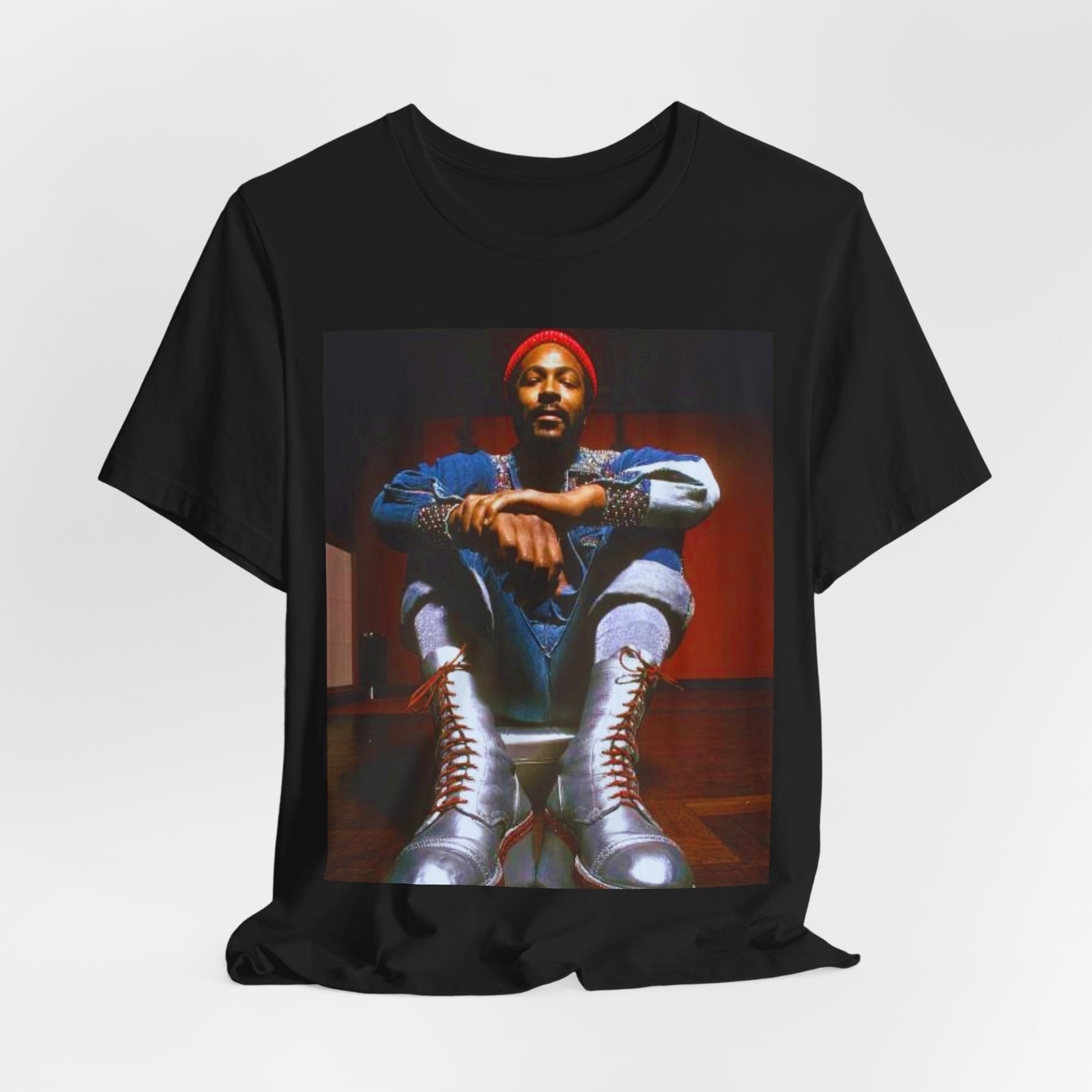 A black graphic t-shirt featuring a graphic of Marvin Gaye as the King of Motown soul legend.