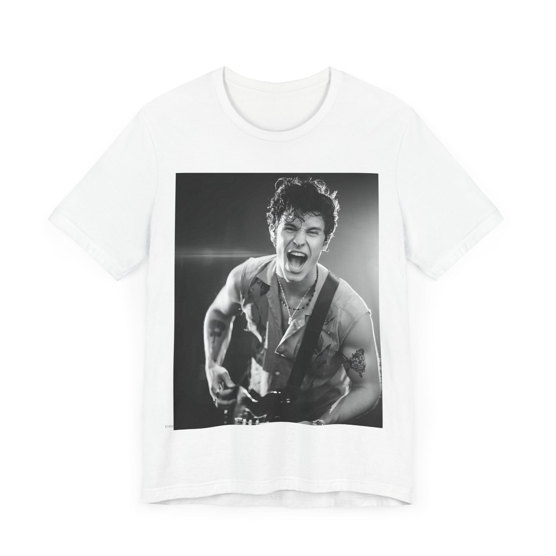 A black graphic t-shirt featuring a black and white photo of Shawn Mendes, emphasizing his charm.