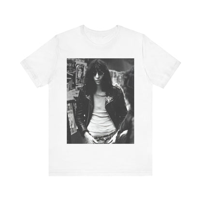 A black graphic t-shirt featuring a 70s black and white photo portrait of Joey Ramone from Ramones.