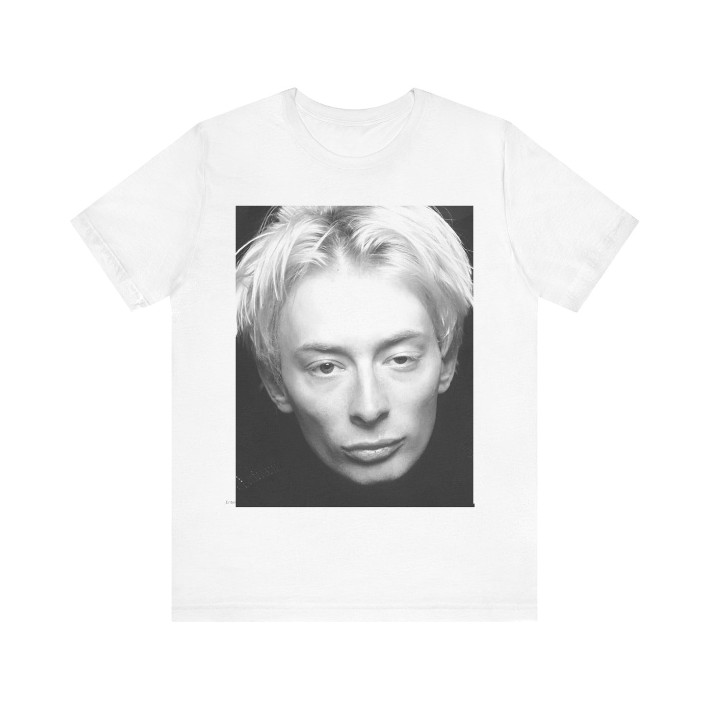 A black graphic t-shirt featuring a 90s black and white portrait photo of Thom Yorke from Radiohead.