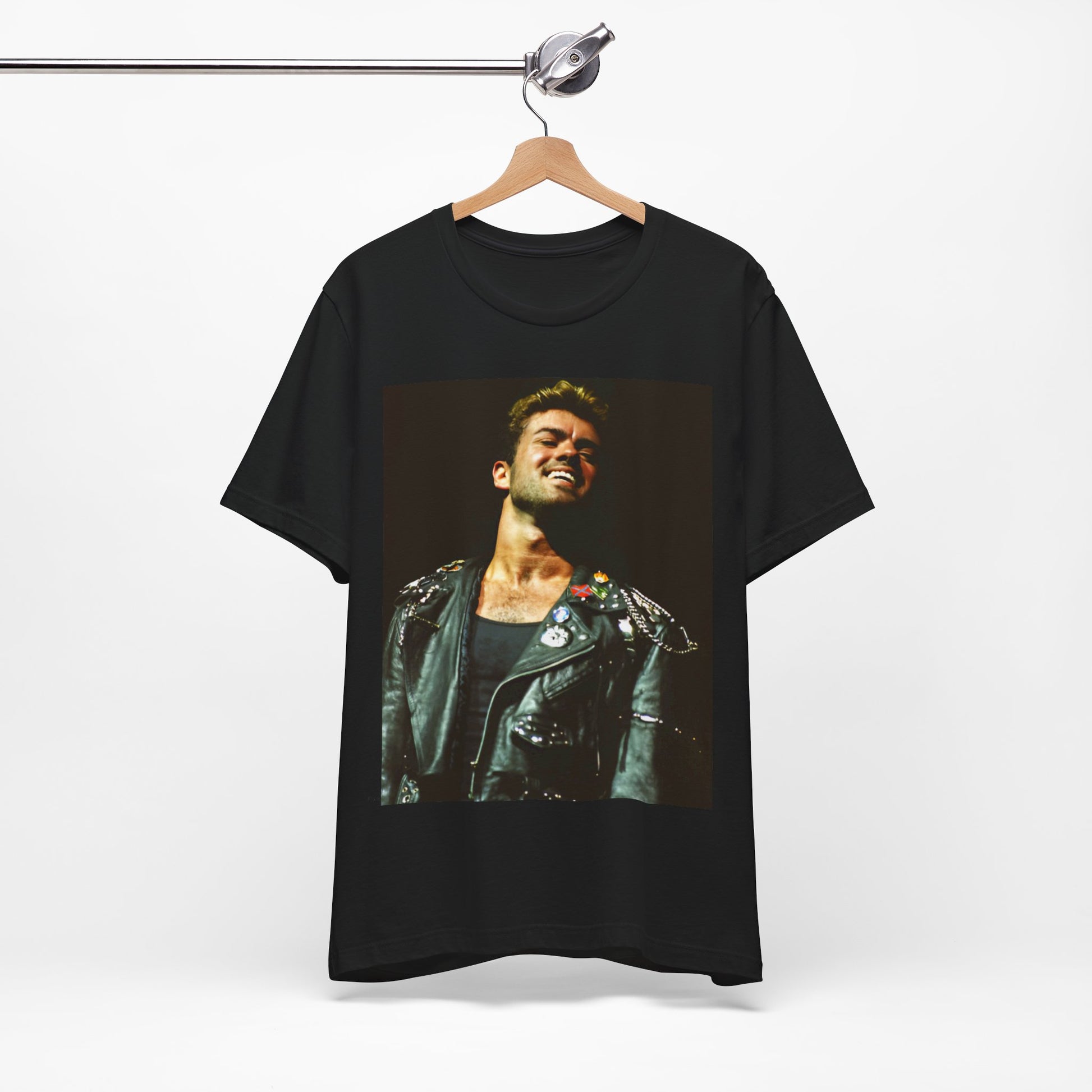 A black graphic t-shirt featuring a graphic related to George Michael's 'Careless Whisper' song or era.
