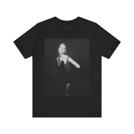 A black graphic t-shirt featuring a classic photo portrait of Ariana Grande.