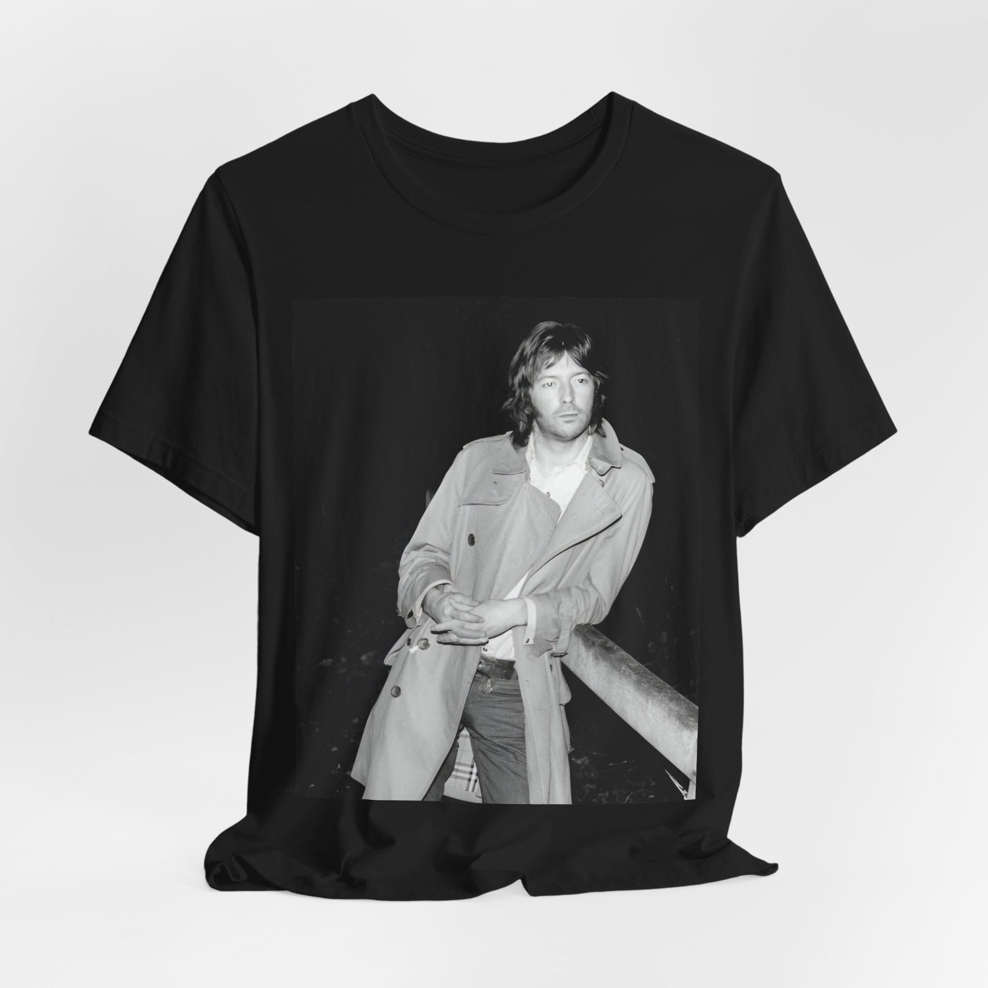 A black graphic t-shirt featuring a retro graphic of Eric Clapton as a blues master.