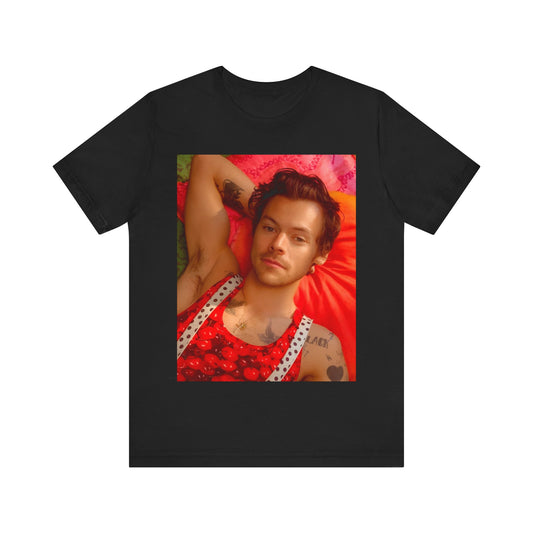 A black graphic t-shirt featuring a graphic of Harry Styles with a chill pop vibe.