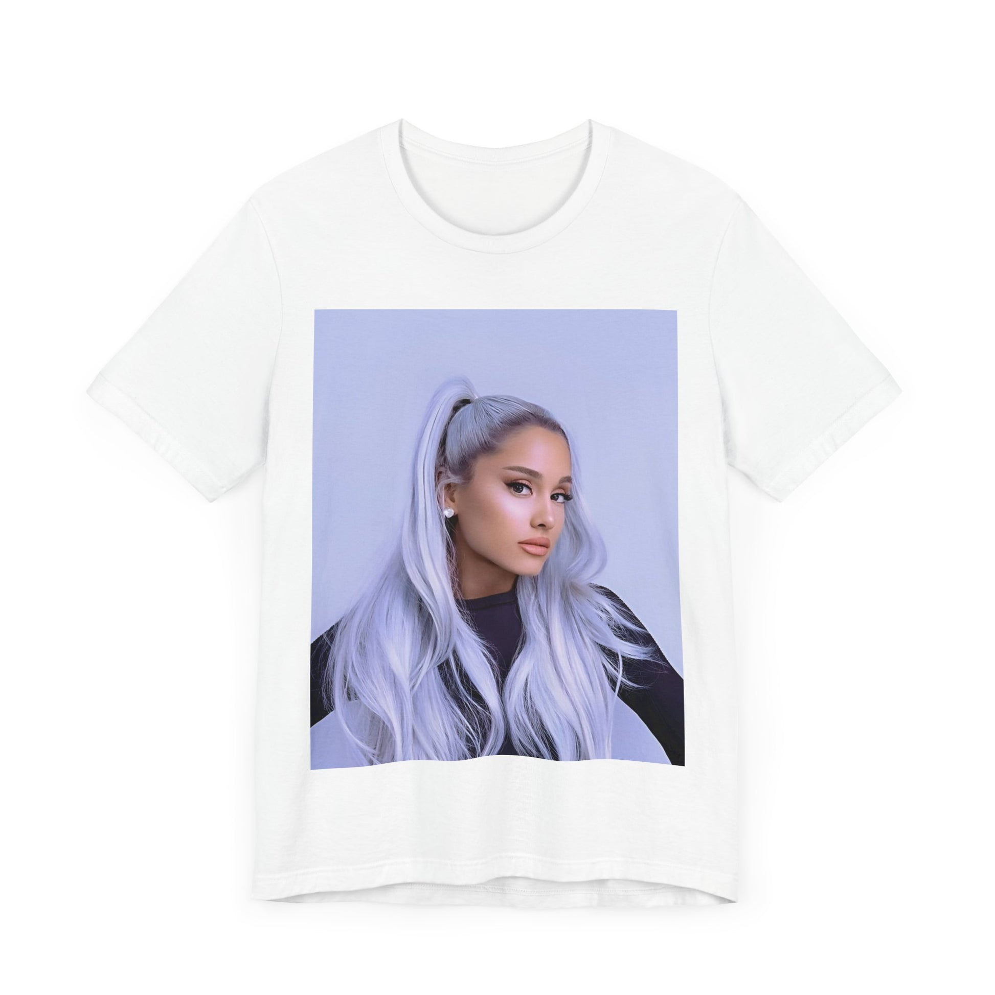 A black graphic t-shirt featuring a stylized graphic of Ariana Grande, possibly with a crown or 'Pop Queen' text, emphasizing her iconic status.
