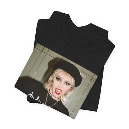 A black graphic t-shirt featuring a graphic related to Miley Cyrus' 'Bad Karma' era.