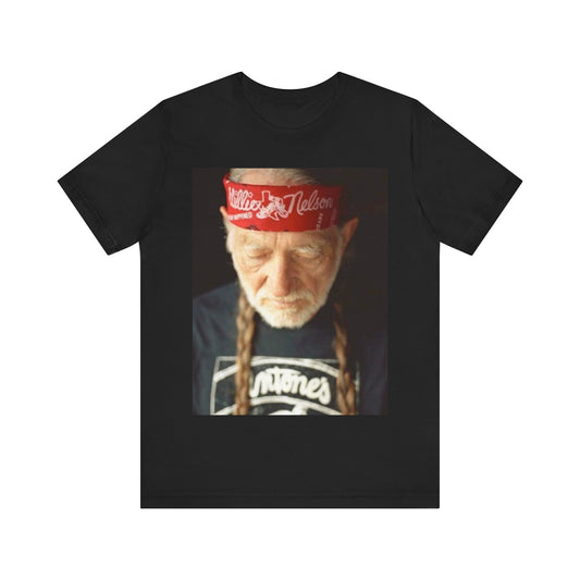A black graphic t-shirt featuring a Texas music aesthetic graphic of Willie Nelson.