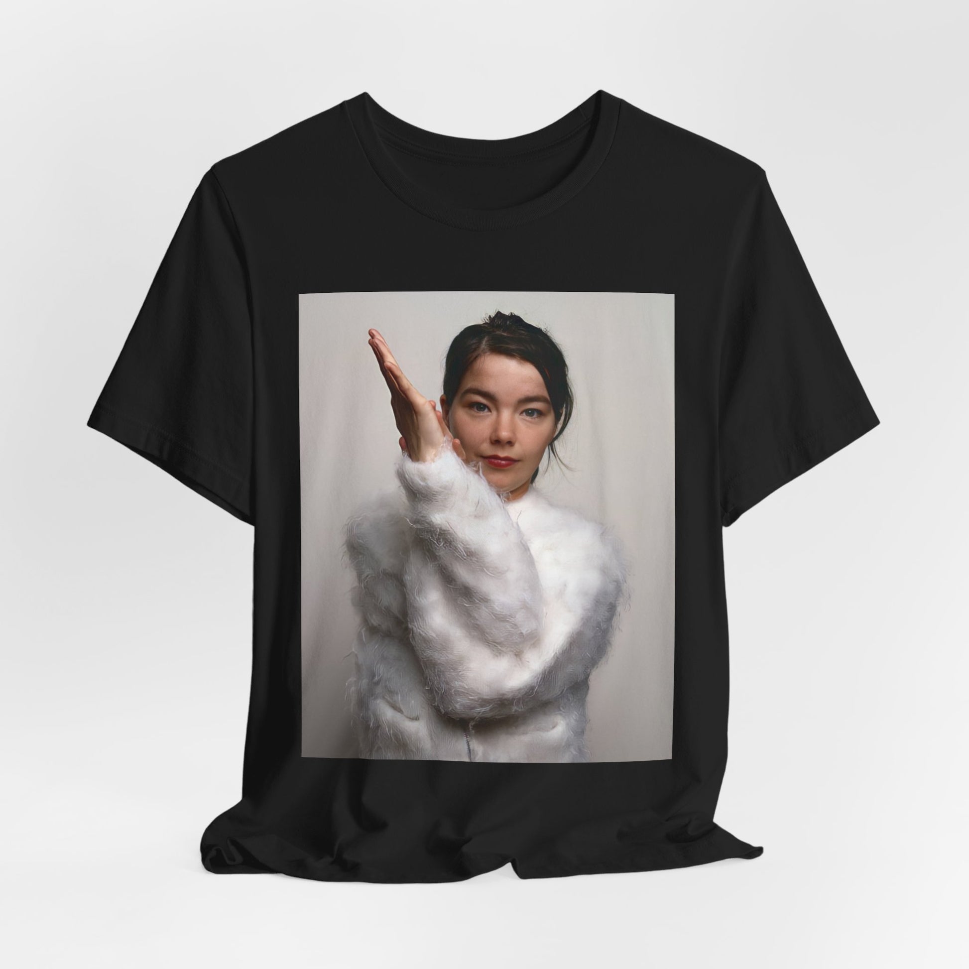 A black graphic t-shirt featuring a classic indie music graphic of Bjork.