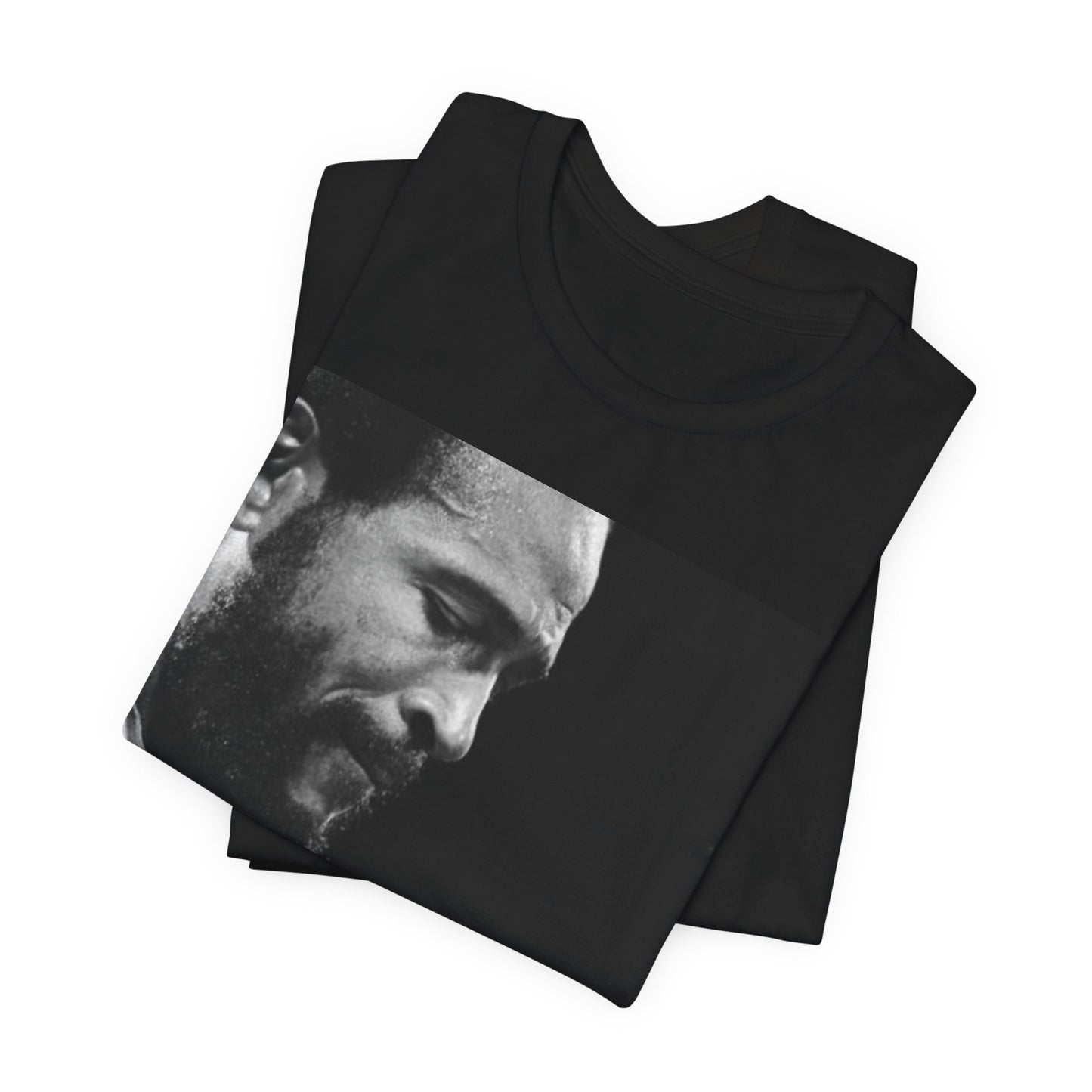 A black graphic t-shirt featuring a 70s graphic of Marvin Gaye emphasizing his soulful voice.
