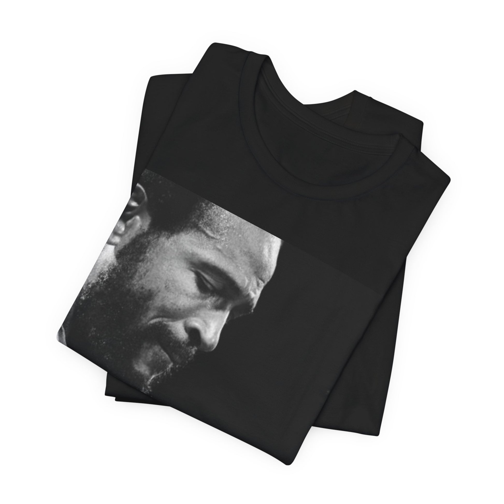 A black graphic t-shirt featuring a 70s graphic of Marvin Gaye emphasizing his soulful voice.