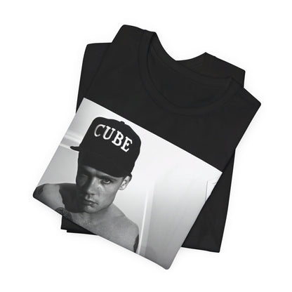 A black graphic t-shirt featuring a black and white graphic or photo of Flea from Red Hot Chili Peppers performing live on stage.