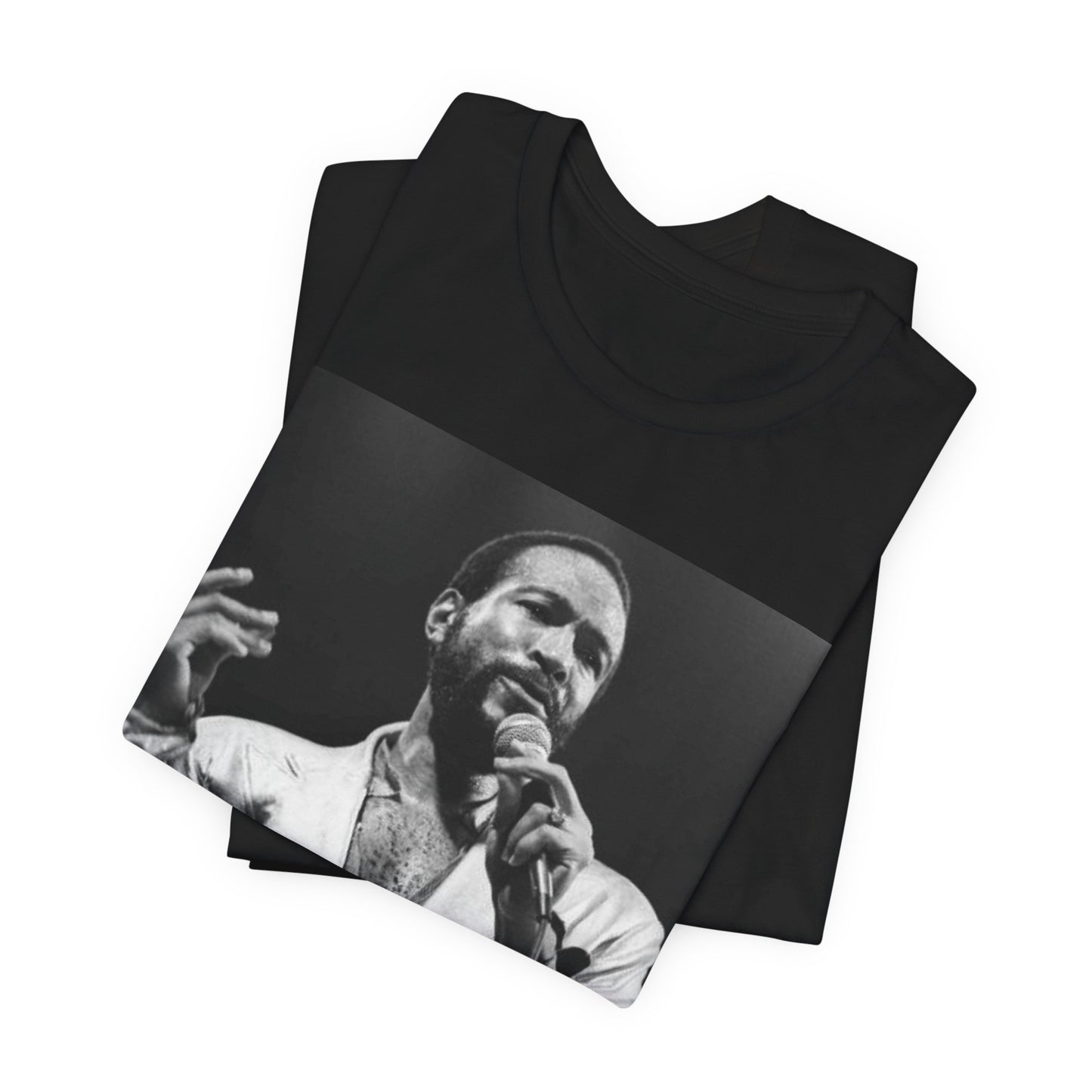 A black graphic t-shirt featuring a retro black and white photo or graphic of Marvin Gaye performing live on stage.