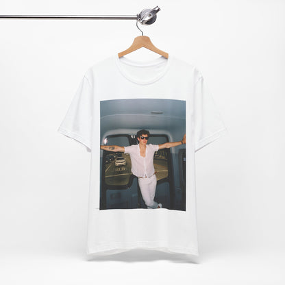 A black graphic t-shirt featuring a graphic of Shawn Mendes with a classic confident look.