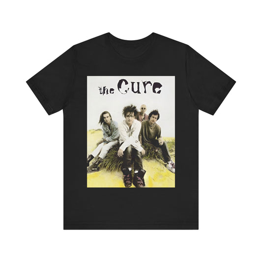 A black graphic t-shirt featuring a graphic of The Cure as post-punk pioneers.
