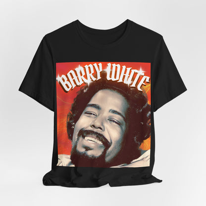 A black graphic t-shirt featuring a graphic of Barry White, emphasizing his iconic soulful presence from the 1970s.