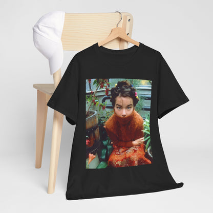 A black graphic t-shirt featuring a dynamic and 'fierce' graphic of Bjork, emphasizing her strong and confident presence.