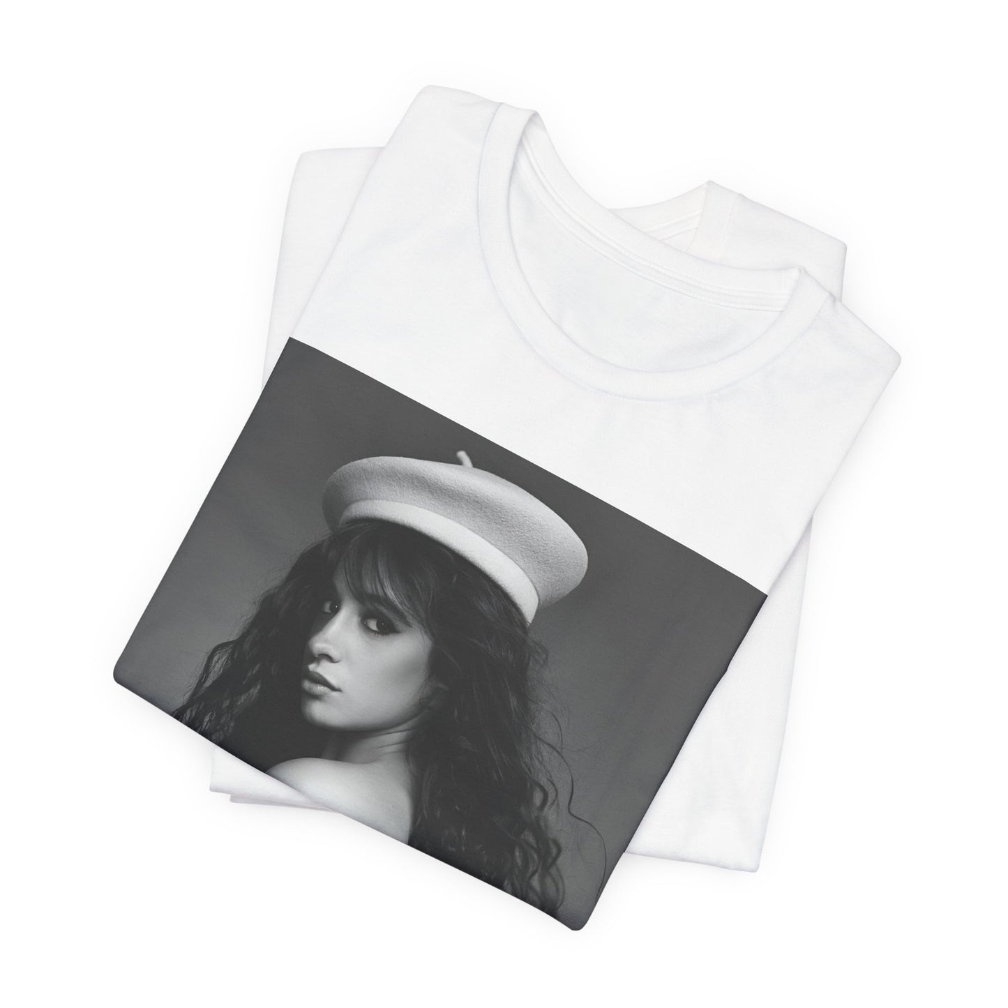 A black graphic t-shirt featuring a black and white graphic of Camila Cabello as a fierce Latina pop star.