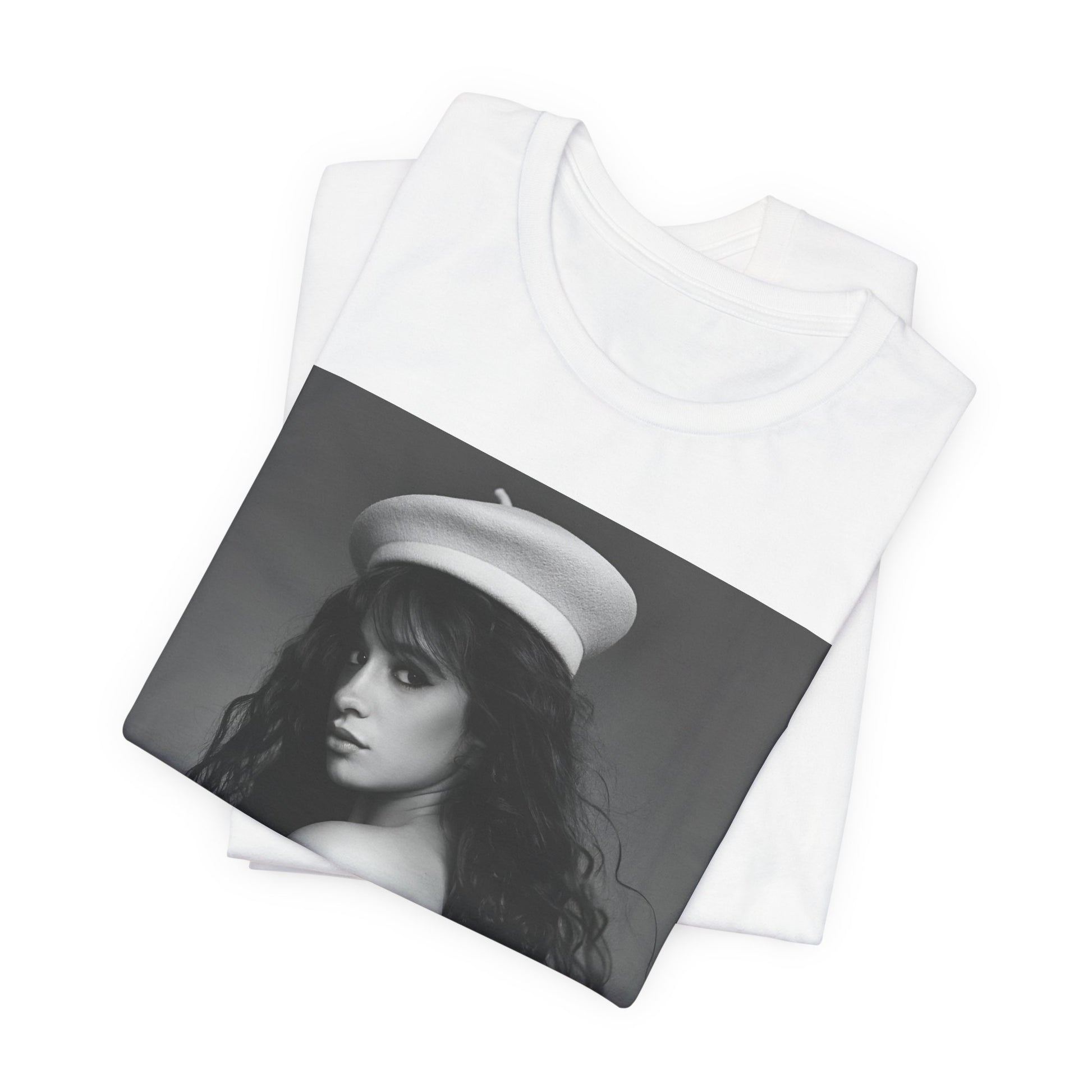 A black graphic t-shirt featuring a black and white graphic of Camila Cabello as a fierce Latina pop star.