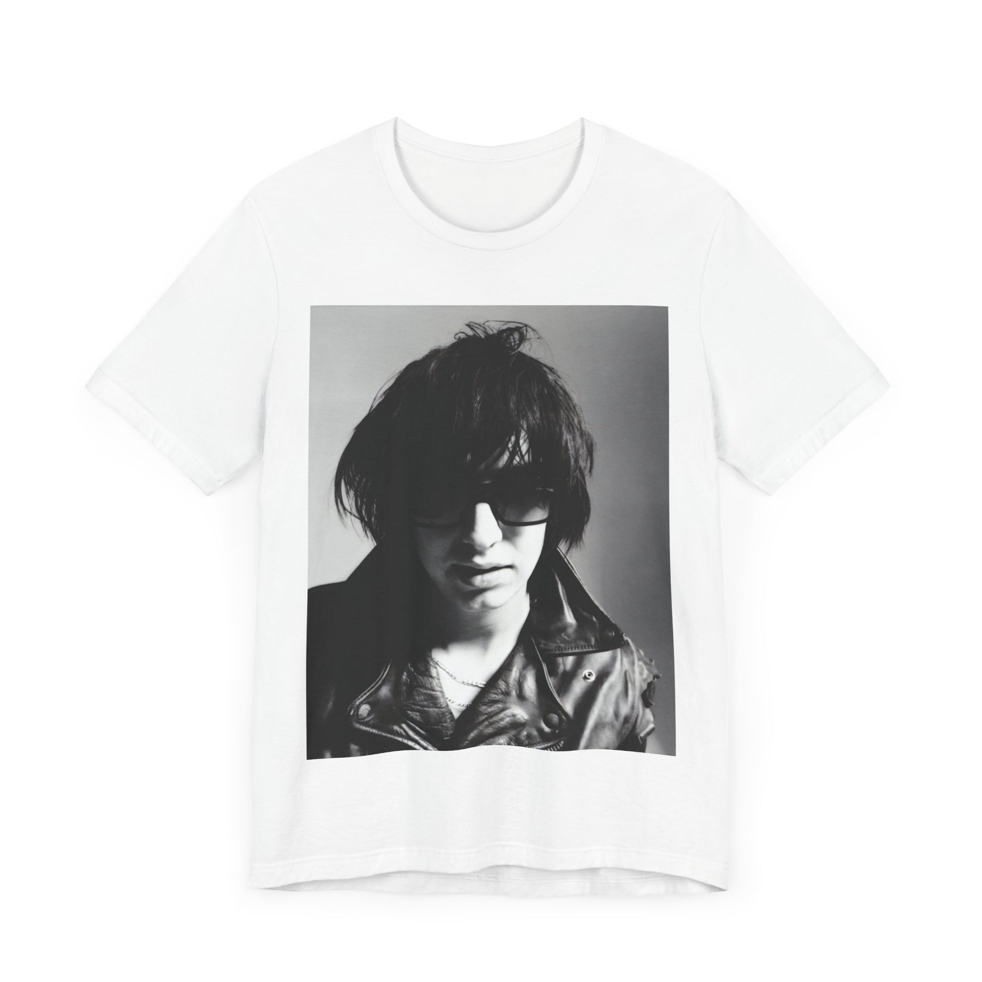 A black graphic t-shirt featuring a graphic related to The Strokes' 'Reptilia' song or era.