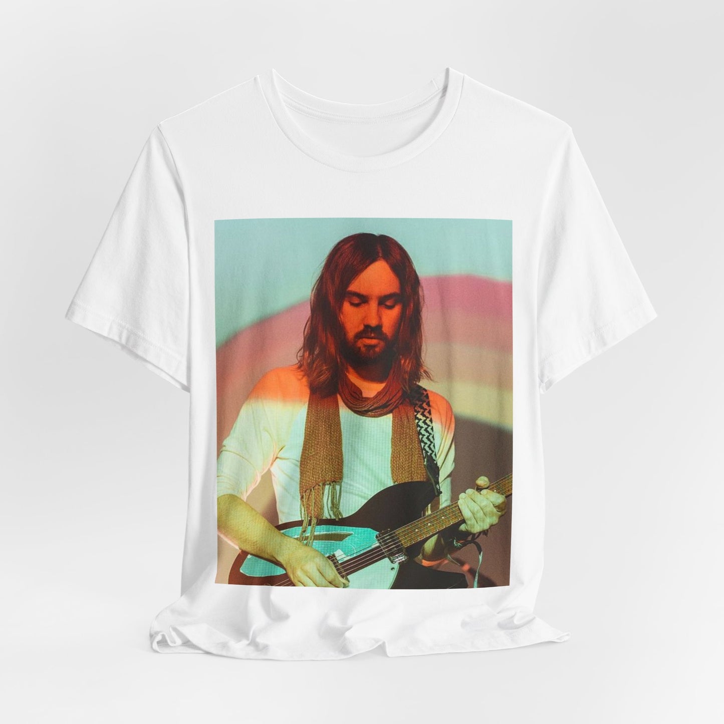 A black graphic t-shirt featuring a dream rock aesthetic graphic of Tame Impala.