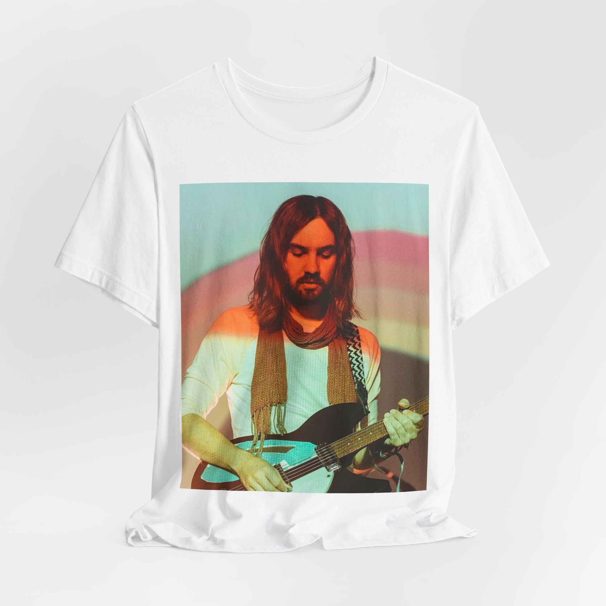 A black graphic t-shirt featuring a dream rock aesthetic graphic of Tame Impala.