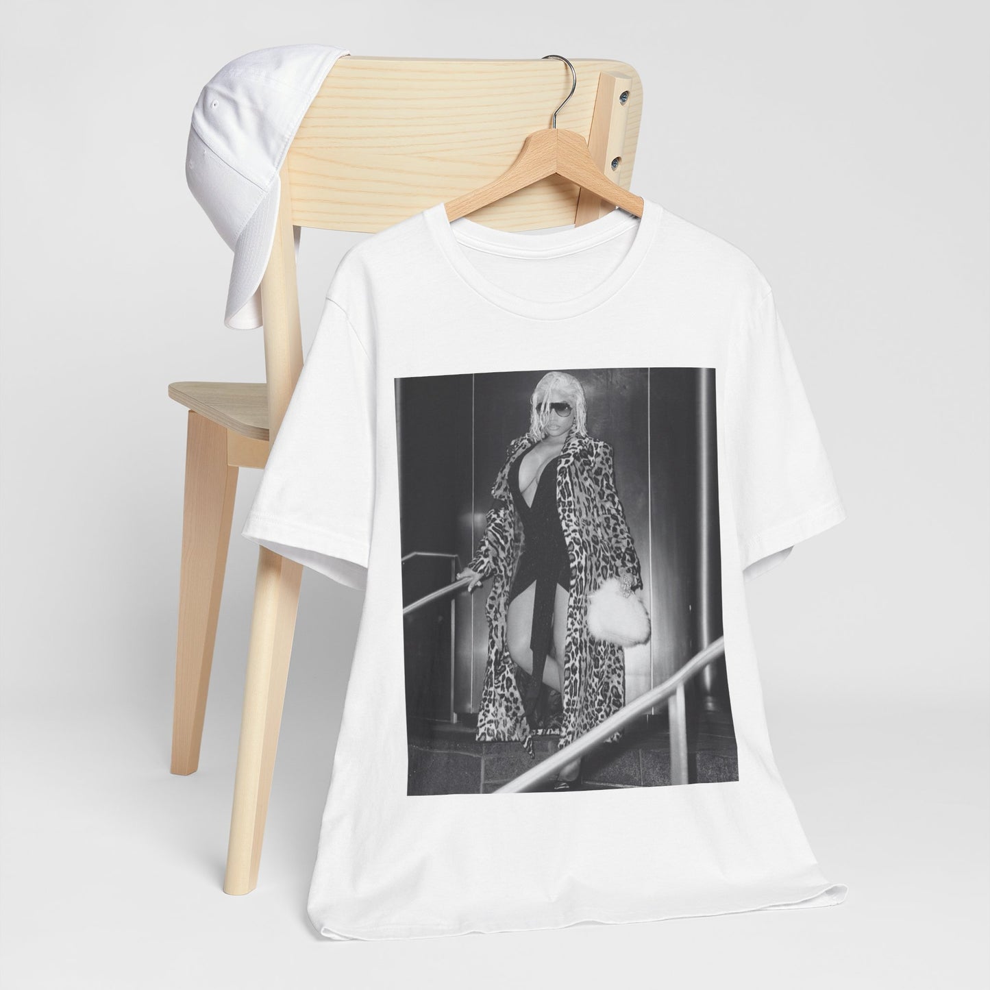 A black graphic t-shirt featuring a black and white glam aesthetic graphic of Nicki Minaj.