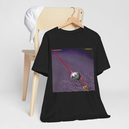 A black graphic t-shirt featuring a graphic related to Tame Impala's 'Currents' album.