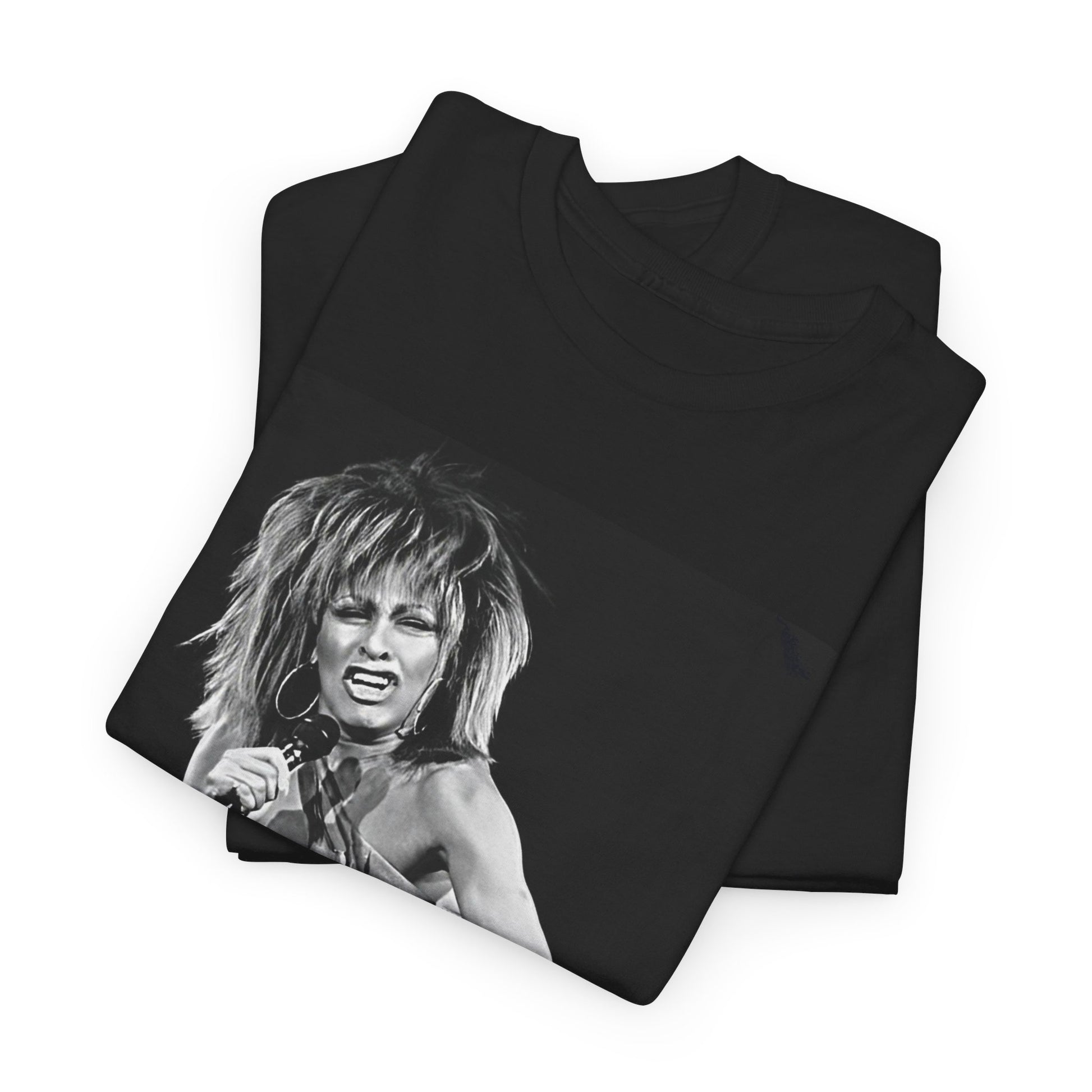 A black graphic t-shirt featuring a graphic of Tina Turner as an inspiring legend.