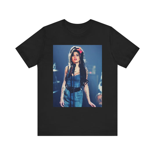 A black graphic t-shirt featuring a graphic related to Amy Winehouse's 'Back to Black' album, emphasizing a soulful aesthetic.