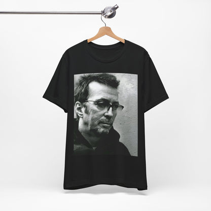 A black graphic t-shirt featuring a black and white, monochrome graphic or photo of Eric Clapton.