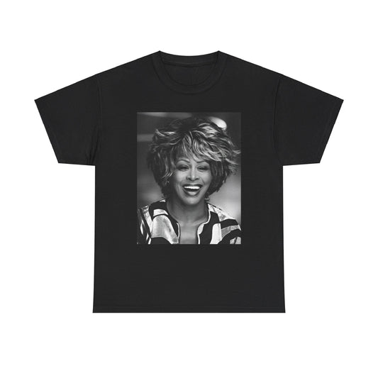A black graphic t-shirt featuring a classic 80s pop aesthetic graphic of Tina Turner.