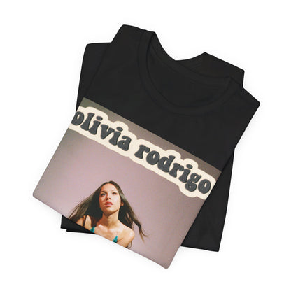 A black graphic t-shirt featuring a fierce graphic related to Olivia Rodrigo's 'good 4 u' song or era.
