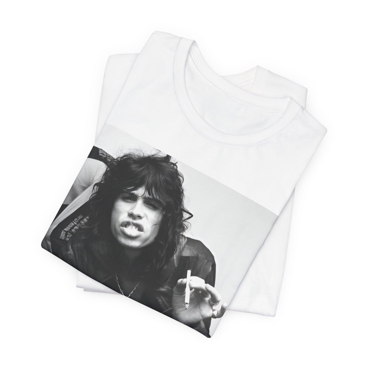 A black graphic t-shirt featuring a retro 70s photo of Aerosmith band members lounging in leather, exuding a cool, classic rock vibe.