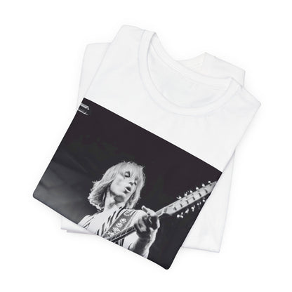 A black graphic t-shirt featuring a graphic of Tom Petty as a Rock & Roll Hall of Fame icon.