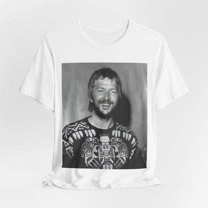 A black graphic t-shirt featuring a 70s photo portrait of Eric Clapton.