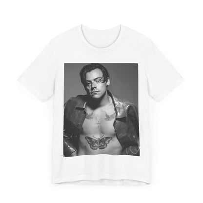 A black graphic t-shirt featuring a black and white portrait photo of Harry Styles.
