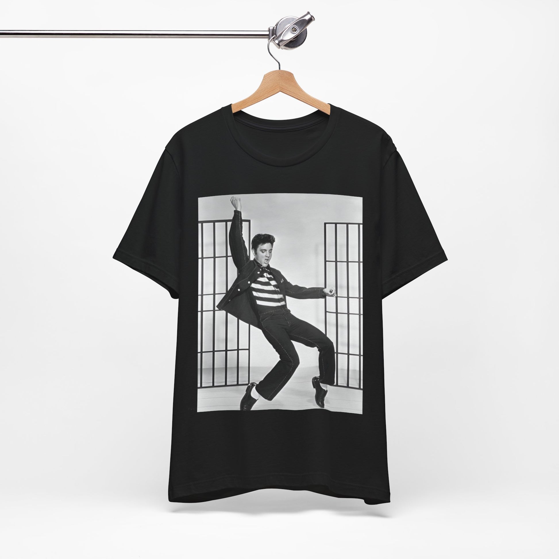 A black graphic t-shirt featuring a graphic related to Elvis Presley's 'Jailhouse Rock' song.