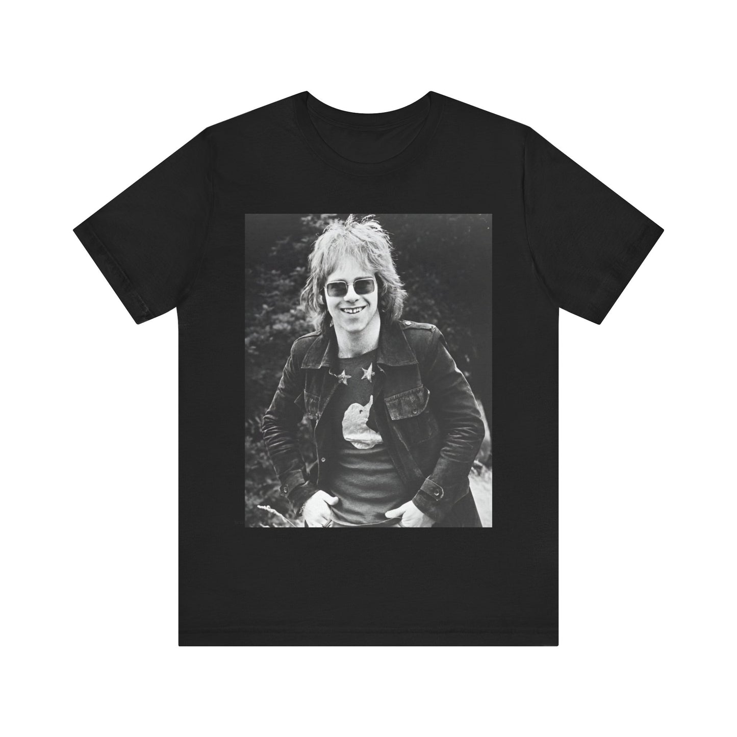 A black graphic t-shirt featuring a 70s black and white monochrome graphic or photo of Elton John.