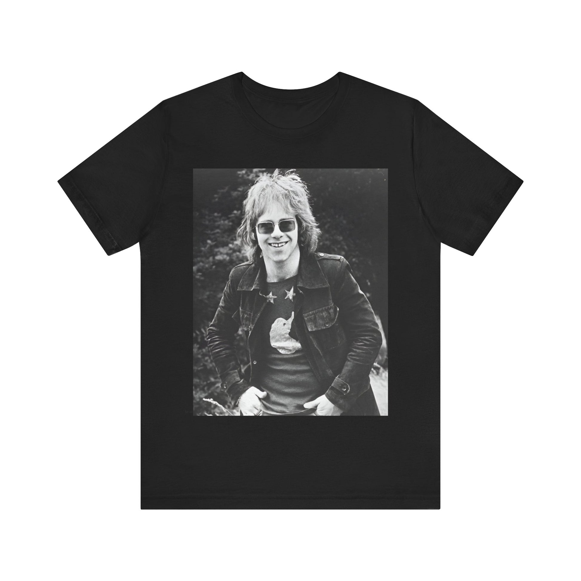 A black graphic t-shirt featuring a 70s black and white monochrome graphic or photo of Elton John.