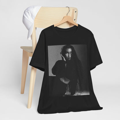 A black graphic t-shirt featuring a black and white graphic or photo of Nicki Minaj as a glamour queen.