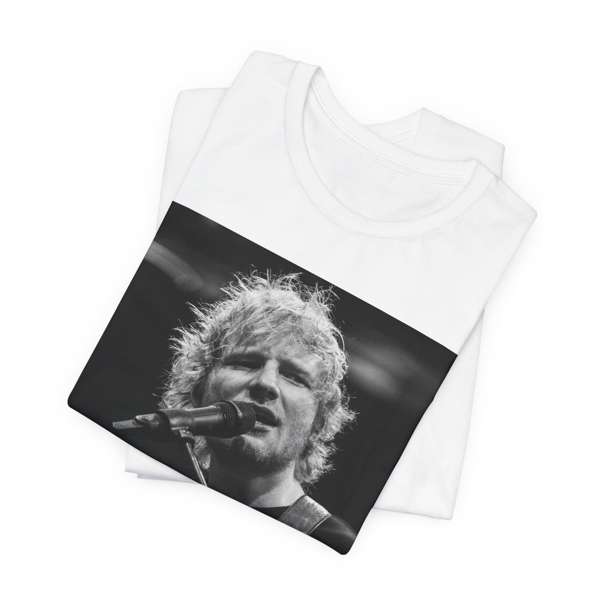 A black graphic t-shirt featuring a black and white photo of Ed Sheeran performing live.