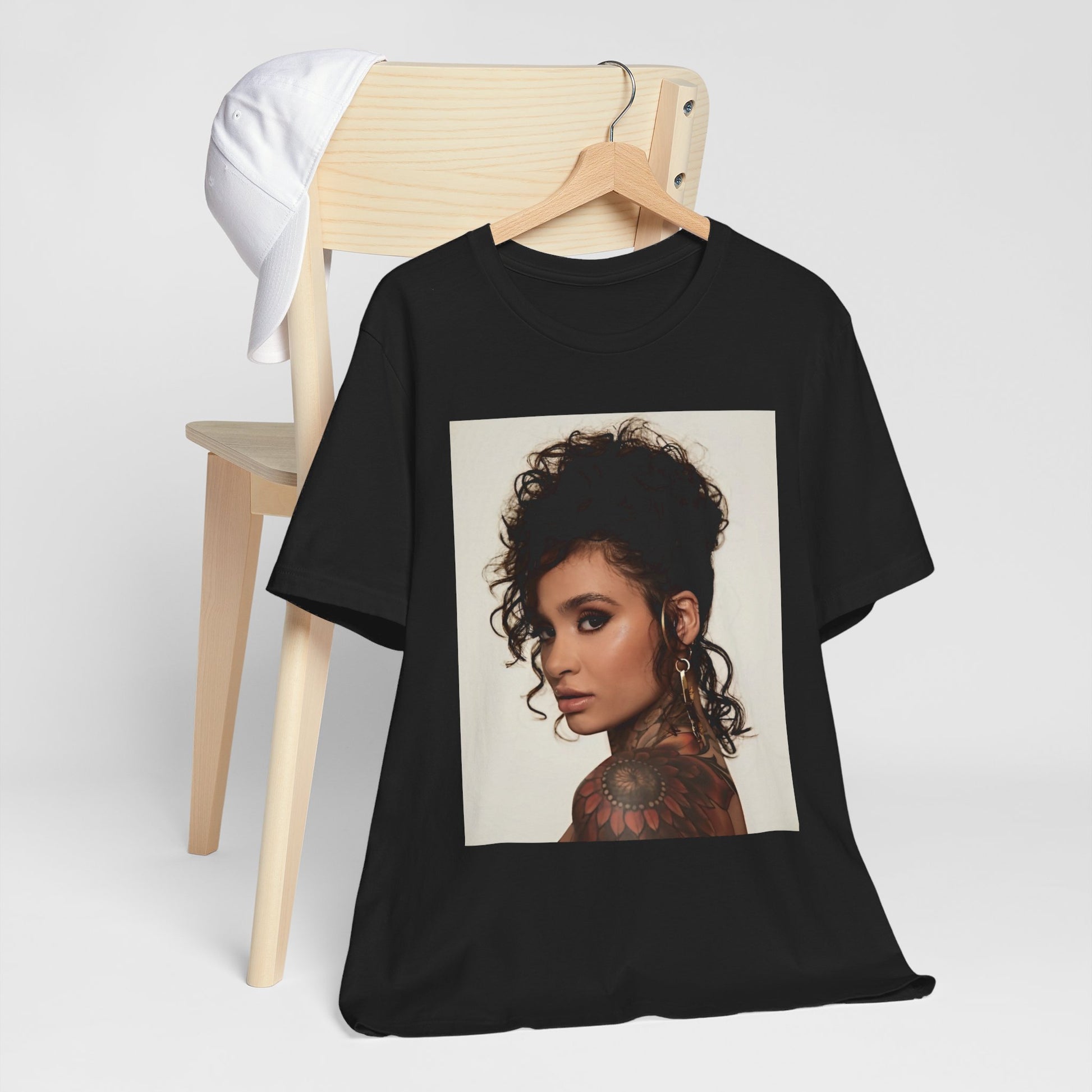 A black graphic t-shirt featuring a retro graphic related to Kehlani's 'SweetSexySavage' album era.