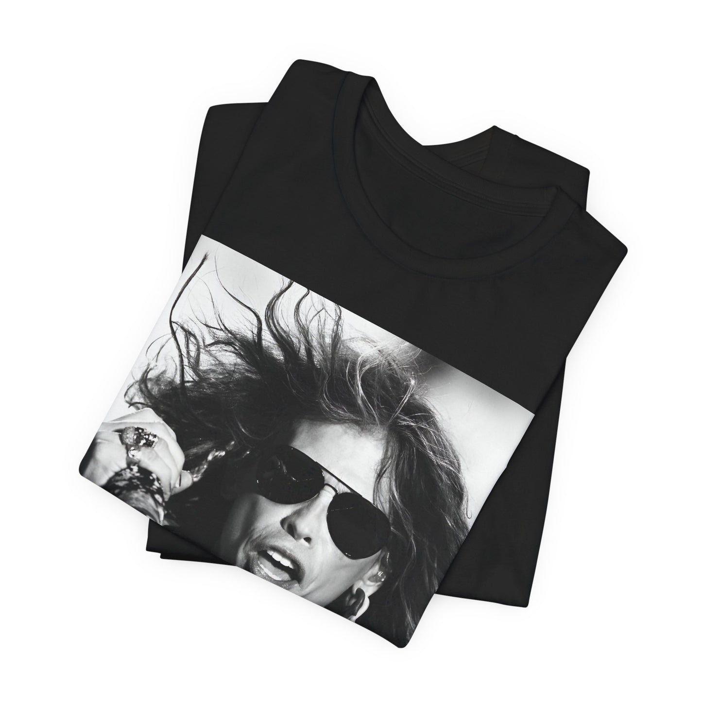 A black graphic t-shirt featuring a black and white photo of Aerosmith's Steven Tyler with his signature scarf and microphone, captured during a dynamic performance.